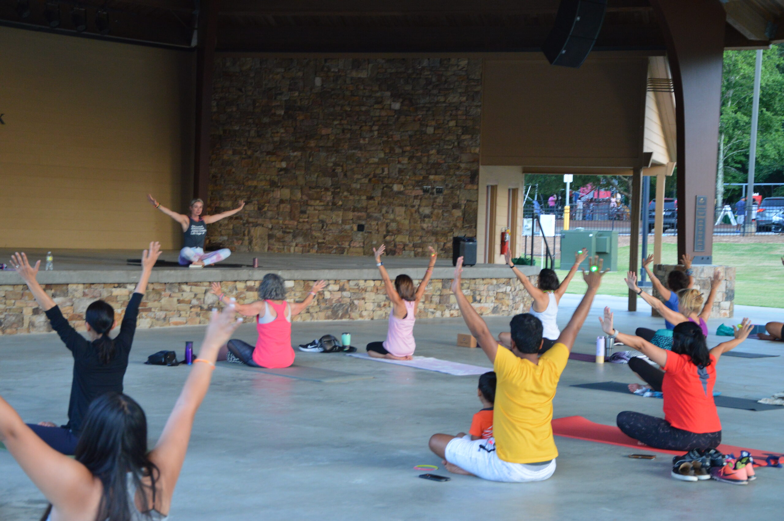 Residents doing yoga outdoors